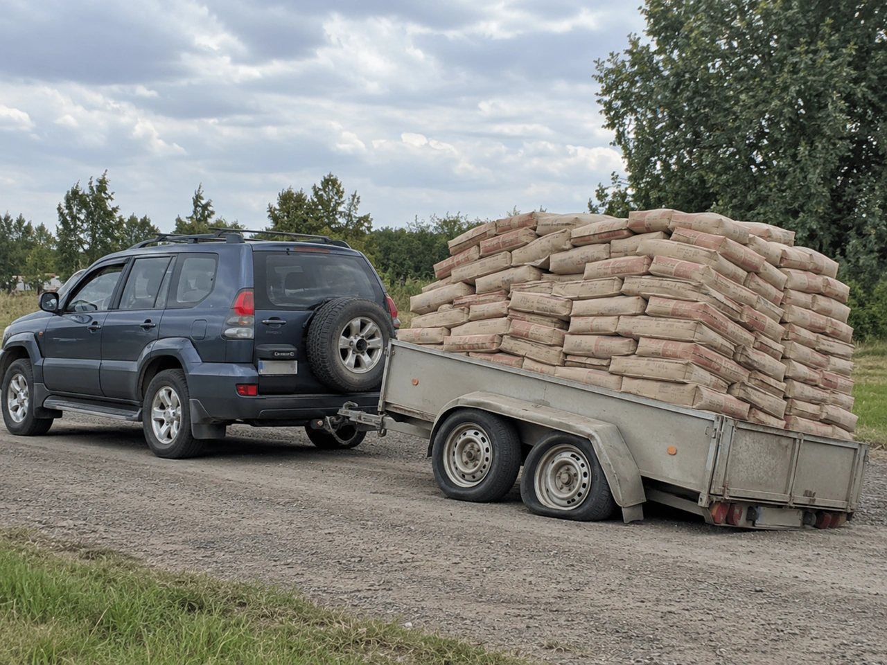 Why should you avoid overloading a trailer?