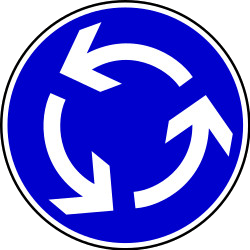 Mandatory roundabout direction.