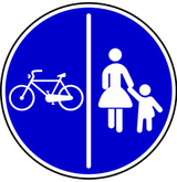 Via dividida obrigatória para peões e ciclistas.