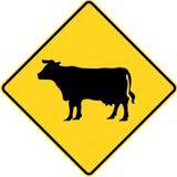 Warning for cattle on the road.