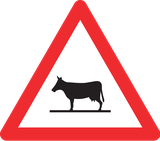 Warnung vor Rindern auf der Fahrbahn.
