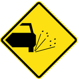 Warning for loose chippings on the road surface.