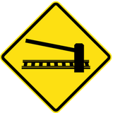Warning for a railway crossing with barriers.