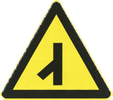 Warning for merging traffic from the left.