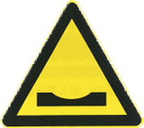 Warning for a dip in the road.
