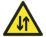 Warning for a road with two-way traffic.