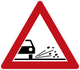 Warning for loose chippings on the road surface.