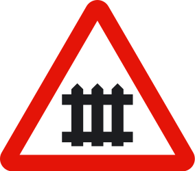 Warning for a railway crossing with barriers.