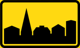 Start of a built-up area.