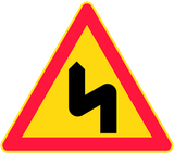Warning for a double curve, first left then right.