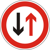 Road narrowing, give way to oncoming drivers.