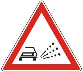 Warning for loose chippings on the road surface.