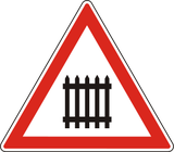 Warning for a railway crossing with barriers.