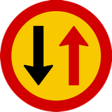 Road narrowing, give way to oncoming drivers.