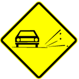 Warning for loose chippings on the road surface.