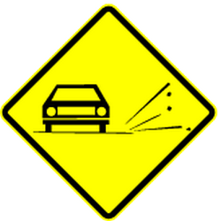 Warning for loose chippings on the road surface.
