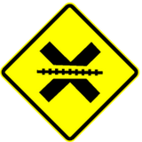 Warning for a railway crossing without barriers.