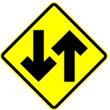 Warning for a road with two-way traffic.