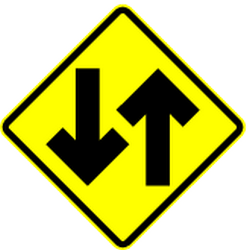 Warning for a road with two-way traffic.