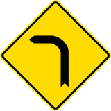 Warning for a sharp curve to the left.
