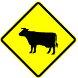 Warning for cattle on the road.