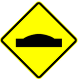 Warning for a speed bump.