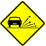 Warning for loose chippings on the road surface.