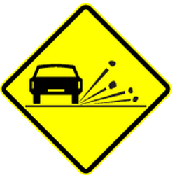 Warning for loose chippings on the road surface.