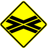 Warning for a railway crossing without barriers.