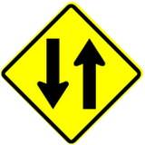 Warning for a road with two-way traffic.
