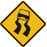 Warnung vor rutschiger Fahrbahn.