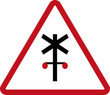 Warning for a railway crossing with barriers.