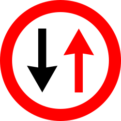 Road narrowing, give way to oncoming drivers.