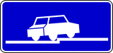 Angle parking partially on pavement.