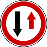 Road narrowing, give way to oncoming drivers.