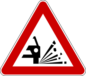Warning for loose chippings on the road surface.