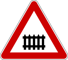 Warning for a railway crossing with barriers.