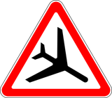Warnung vor tief fliegenden Flugzeugen.