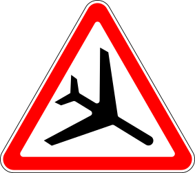 Warnung vor tief fliegenden Flugzeugen.