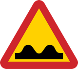 Warnung vor schlechter Fahrbahn.