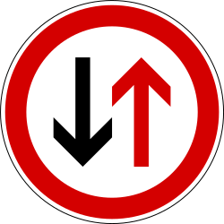Road narrowing, give way to oncoming drivers.