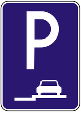 Estacionamiento solo en arcén o acera.