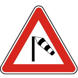 Advertencia de viento lateral fuerte.