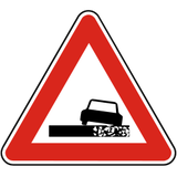 Advertencia de arcén inestable.