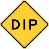 Warning for a dip in the road.