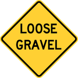 Warning for loose chippings on the road surface.